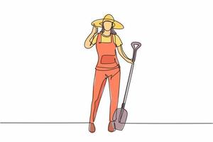 Single one line drawing of female farmer stood with a thumbs-up gesture, wearing a straw hat and carrying a shovel to plant crops on farmland. Continuous line draw design graphic vector illustration.