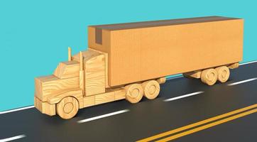 Wooden toy truck carrying a large cardboard box moves fast on the road. photo