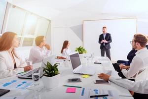 Business people in office work together during a meeting photo