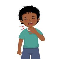 Cute little African boy suffering from sore throat touching his swelling and painful neck as symptoms of flu and allergy vector