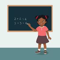 cute little African girl student writing with chalk math equation solution on the blackboard in front of class vector