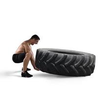 Workout with a big tire photo