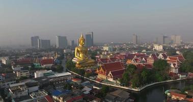 An aerial view of the Giant Buddha and Pagoda at Wat Paknam Phasi Charoen Temple, The most famous tourist attraction in Bangkok, Thailand video