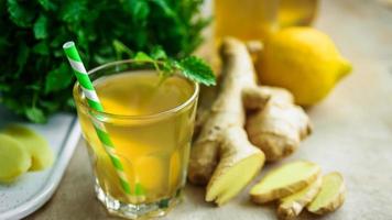 Healthy ginger and lemon drink isolated in an amazing natural background photo