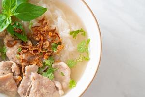 Pho Bo vietnamese soup with pork and rice noodles photo