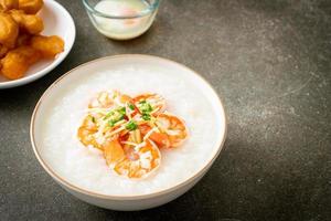 Congee with shrimps and fresh ginger photo