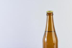 Bottle of beer on table photo