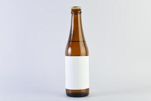 Bottle of beer on table photo