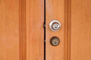 metal knob on wooden door photo