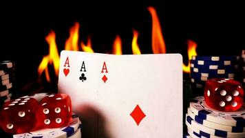 Gambling Poker Cards Money Chips and Red Dices on Fire photo