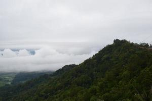 View of the Land above the Clouds village above the Clouds Lolai Hills Village and traditional village covered by clouds in the morning before sunrise photo