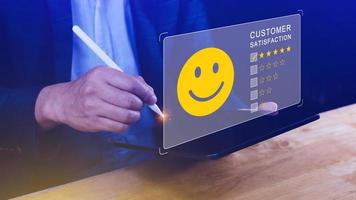 User gives rating to service experience on online application, Customer review satisfaction feedback survey concept, Customer can evaluate quality of service leading to reputation ranking of business. photo