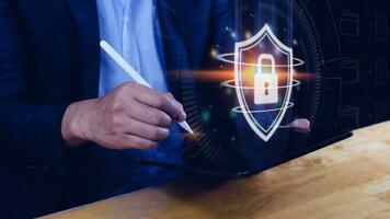 Computer network protection, secure and safe your data concept, businessman holding shield protection icon, Security shield Lock Security Businessman Protect Concept photo
