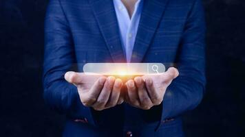 Businessman touching data search box information technology Search Engine Optimization. uses a search box to search for information on the Internet. photo