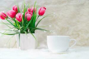 Cup of coffee on table photo