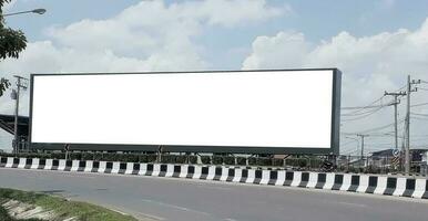 billboard blank for outdoor advertising poster at blue sky. photo