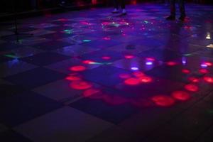 Music and color. Dance floor. Disco and floor lighting. photo