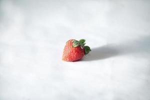 a strawberry, isolated on a white photo