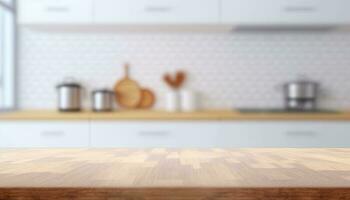 Empty table top over defocused kitchen with copy space photo