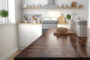 Empty table top over defocused kitchen with copy space photo