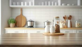 Empty table top over defocused kitchen with copy space photo