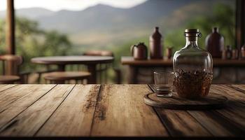 Empty wooden table with a view of blurred tea plantation background photo