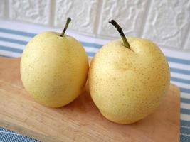 Honey pear. a type of pear with the characteristics of a darker fruit color photo