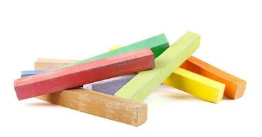 Colored chalk for drawing isolated on white background. photo