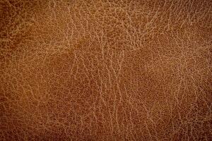 close up brown leather texture and background with space. photo