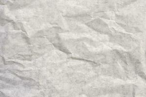 close up old crumpled white paper texture and background photo