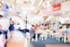 Abstract blur background crowd people in shopping mall for background, Vintage toned. photo