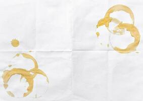 coffee and tea stains on paper background photo