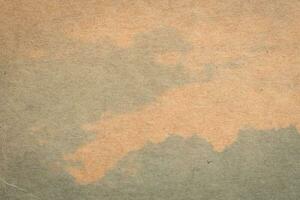 brown paper and blue water colour texture and background with space. photo
