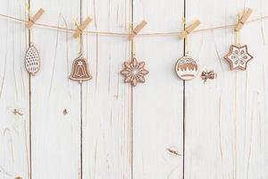 Ornamental christmas decoration hanging on wooden for christmas background with space photo