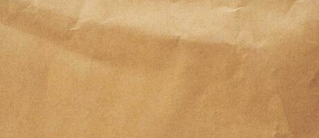 Close up crumpled brown paper texture and background with copy space photo