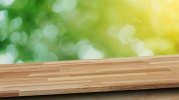 Empty diagonal wooden table with blur tree in garden boekh and mock up for display of product. photo