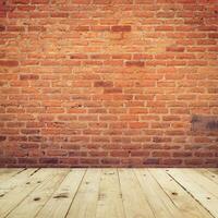 Old brick wall and wooden floor room background texture. photo