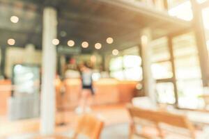 Blurred background Customer at coffee shop blur background with bokeh, Vintage toned. photo