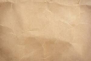 Close up crumpled brown paper texture and background photo