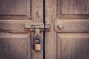 old door knock and key lock wall texture and background photo