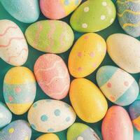 Colorful easter eggs on pastel color background. photo