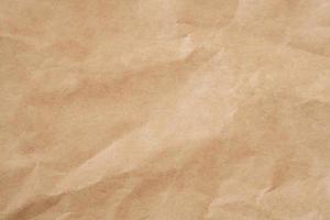 Close up crumpled brown paper texture and background with copy space photo