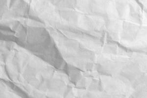 close up crumpled white paper texture and background photo