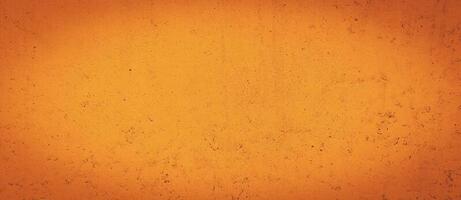 Grunge orange wall concreted wall for interiors texture background. photo