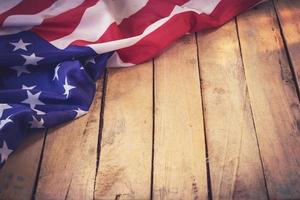 USA flag on wooden wall background and texture with space photo