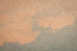 brown paper and blue water colour texture and background with space. photo