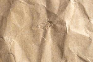 old crumpled brown paper texture and background photo