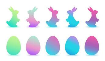 Set of modern gradient Easter eggs and rabbits silhouette isolated on white background. Easter design elements. Vector illustration of painted eggs and bunnies.