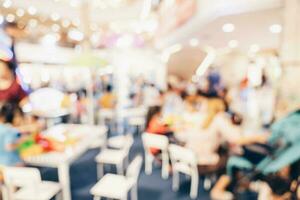 Abstract blur background crowd people in shopping mall for background, Vintage toned. photo