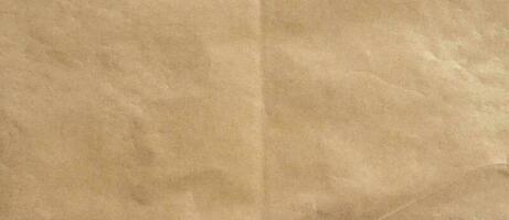 crumpled brown paper background and texture with copy  space. photo